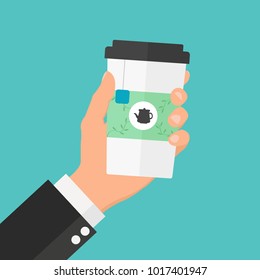 Disposable tea cup in hand. Flat design illustration