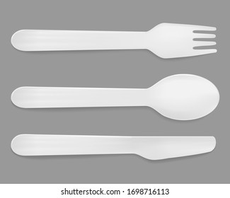 Disposable white plastic cutlery. Vector spoon, knife and fork.