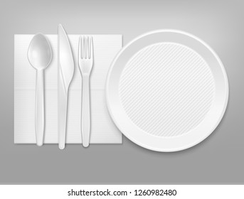 Disposable white plastic plate cutlery knife fork spoon on napkin top view realistic tableware set vector illustration