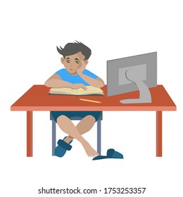 distance learning.  a bored schoolboy is doing homework.  boy looks into a computer monitor.