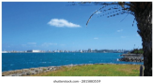 Distant city skyline across wide blue ocean, grassy foreground with tree branches, sunny day with clouds, urban and nature contrast.