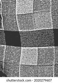 Distress grunge vector texture of fabric with tartan ornament. Black and white background EPS 8 illustration