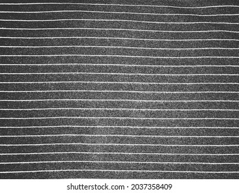 Distress grunge vector texture of knitted fabric, sweater, pullover, jersey with diagonal stripes. Black and white background. EPS 8 illustration