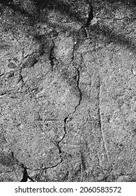 Distress old cracked concrete vector texture. EPS8 illustration. Black and white grunge background. Stone, asphalt, plaster, marble.