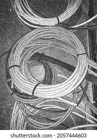 Distress vector texture hank of cable. EPS8 illustration. Black and white grunge background.