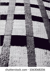 Distressed background in black and white texture with  dark spots, scratches and lines. Abstract vector illustration