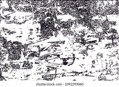 Distressed background in black and white texture with  dark spots, scratches and lines. Abstract vector illustration