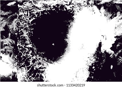 Distressed background in black and white texture with  dark spots, scratches and lines. Abstract vector illustration