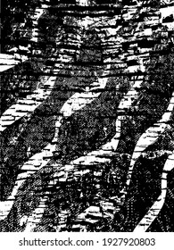 Distressed background in black and white texture with dots, spots, scratches, and lines. Abstract vector illustration.