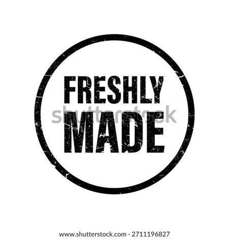 Distressed circular stamp graphic with freshly made text
