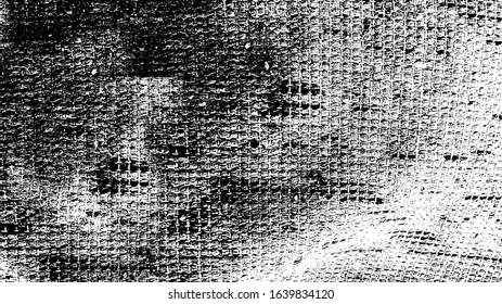 Distressed fabric texture. Vector texture of weaving fabric. Grunge background. Abstract halftone vector illustration. Overlay for interesting effect and depth. Black isolated on white background.
