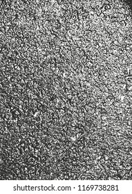 Distressed overlay texture of cracked concrete, stone or asphalt. grunge background. abstract halftone vector illustration