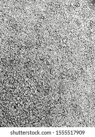 Distressed overlay texture of cracked concrete, stone or asphalt. grunge background. abstract halftone vector illustration