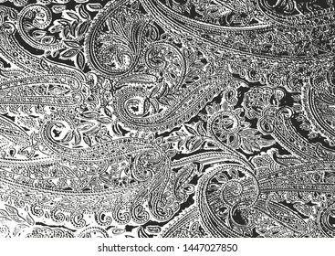 Distressed overlay texture of fabric. Textile with eastern floral ornament, leaves and flowers. grunge background. abstract halftone vector illustration.