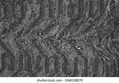 Distressed overlay texture of tire tracks. grunge background. abstract halftone vector illustration