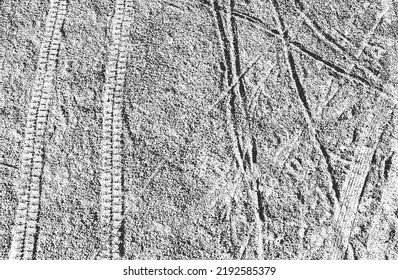 Distressed overlay texture of tire tracks. grunge background. abstract halftone vector illustration