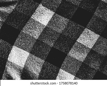 Beklemmte Overlay-Textur aus Webgewebe, Strickdecke mit Tartan-Ornament. brüchiger Hintergrund. abstrakte Halbtonvektorgrafik