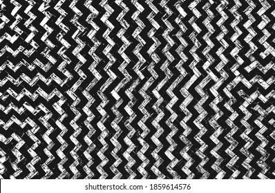 Distressed overlay texture of weaving fabric with zigzag ornament. grunge background. abstract halftone vector illustration