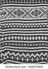 Textura superpuesta angustiada de tejido, suéter de punto ornamental, trenzas, jersey, pullover. fondo grueso. ilustración abstracta de vector de medio tono