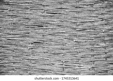 Distressed overlay wicker vine texture. grunge black and white background. abstract halftone vector illustration