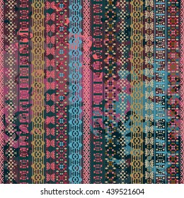 Distressed seamless pattern. Tribal art colorful print, brushed texture. Abstract background, watercolor paint spots