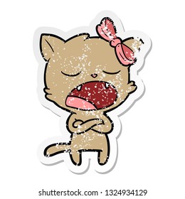 distressed sticker of a annoyed cartoon cat