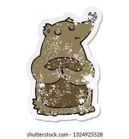 adesivo angustiado de um urso de desenho animado