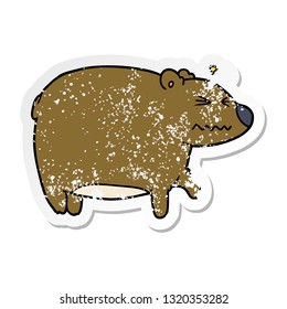 distressed sticker of a cartoon bear with a sore head