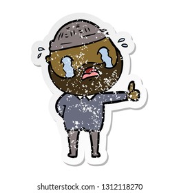 distressed sticker of a cartoon bearded man crying