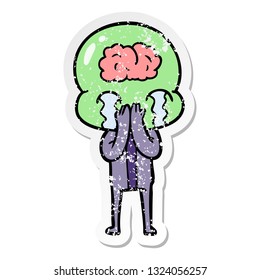 distressed sticker of a cartoon big brain alien crying