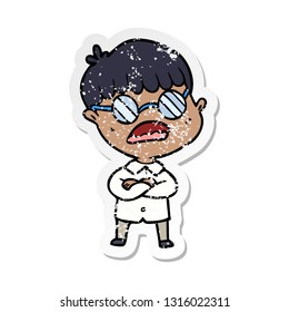 distressed sticker of a cartoon boy with crossed arms wearing spectacles