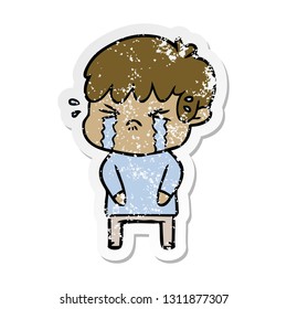 distressed sticker of a cartoon boy crying