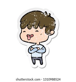 distressed sticker of a cartoon boy sticking out tongue
