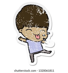 distressed sticker of a cartoon boy sticking out tongue