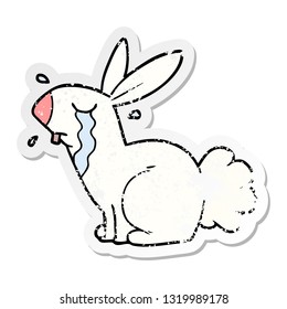 distressed sticker of a cartoon bunny rabbit crying