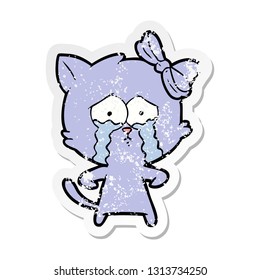 distressed sticker of a cartoon cat