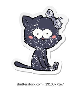 distressed sticker of a cartoon cat