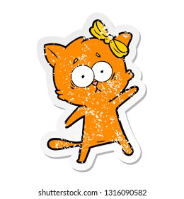 distressed sticker of a cartoon cat
