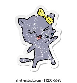 distressed sticker of a cartoon cat