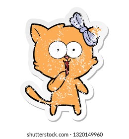 distressed sticker of a cartoon cat
