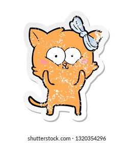 distressed sticker of a cartoon cat