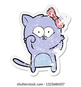 distressed sticker of a cartoon cat