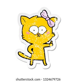 distressed sticker of a cartoon cat