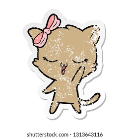 distressed sticker of a cartoon cat with bow on head waving