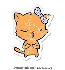 distressed sticker of a cartoon cat with bow on head