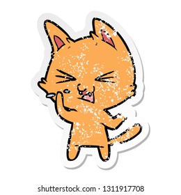 distressed sticker of a cartoon cat hissing