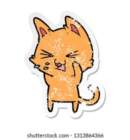 distressed sticker of a cartoon cat hissing
