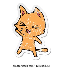 distressed sticker of a cartoon cat hissing