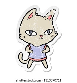 distressed sticker of a cartoon cat staring