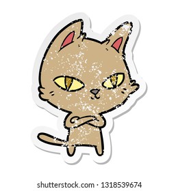 distressed sticker of a cartoon cat staring